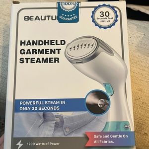 Handheld garment steamer.  Powerful steam in only 30 seconds